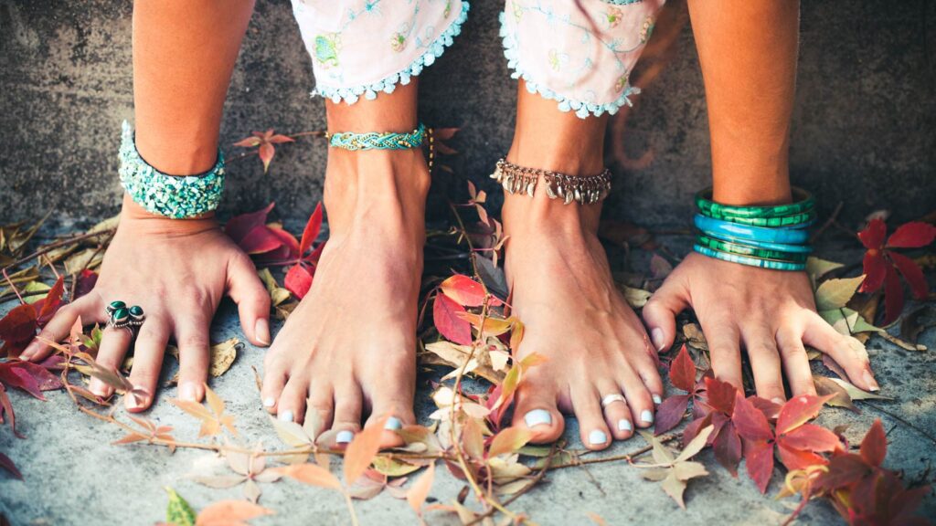 Hands and feet grounded on the floor